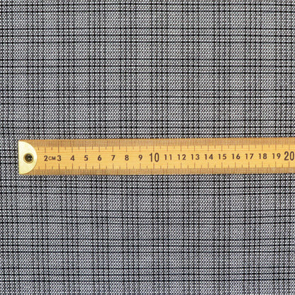 Gray checkered fabric with a ruler for scale